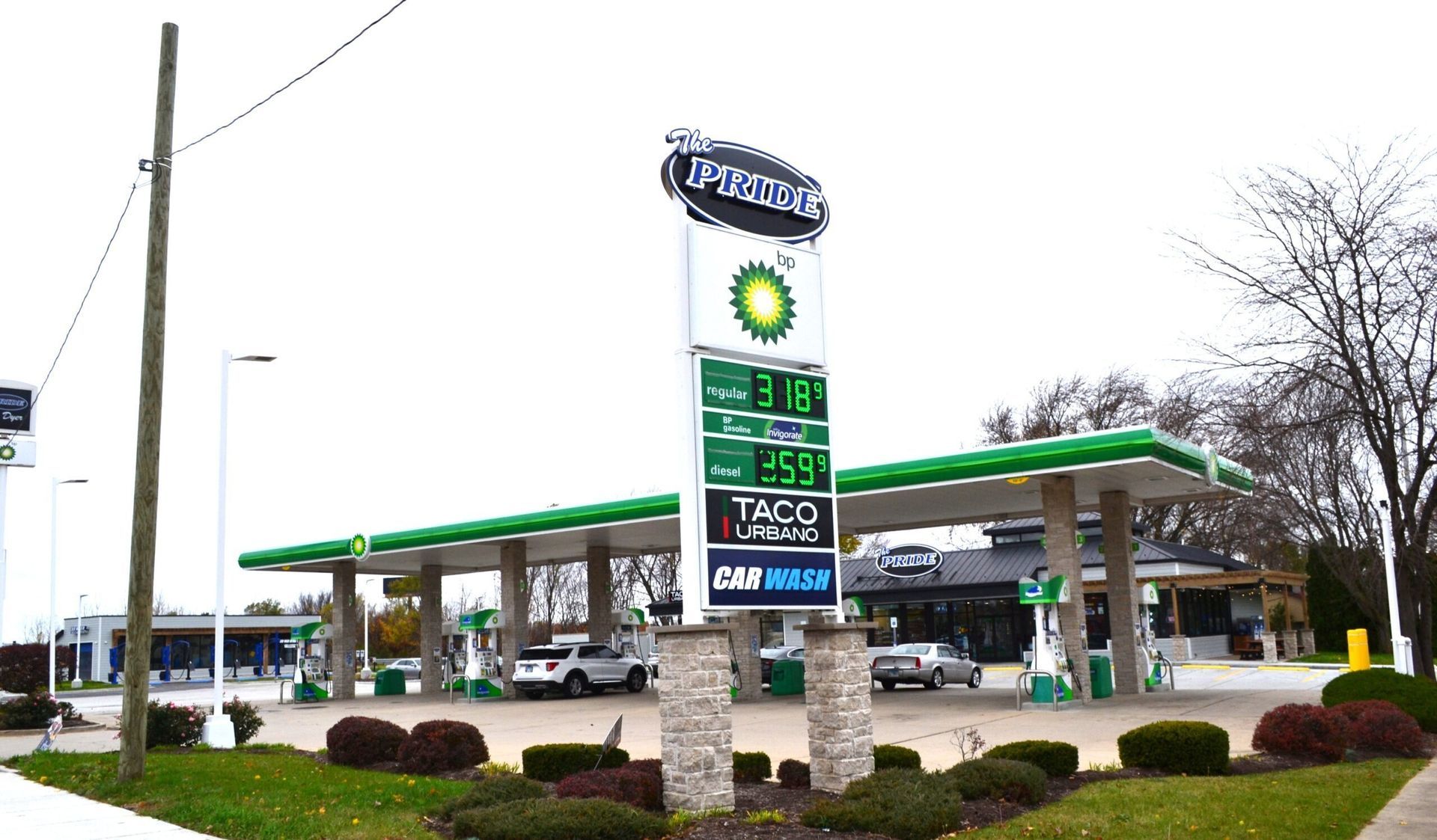 A grocery store filled with lots of shelves and signs.