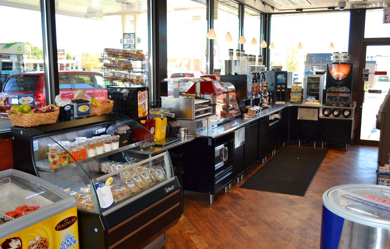 A bakery with a red bull can in the middle of the room