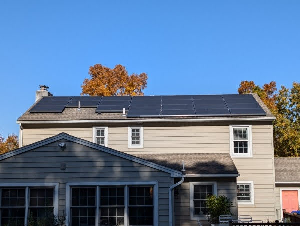 A house with solar panels on the roof.