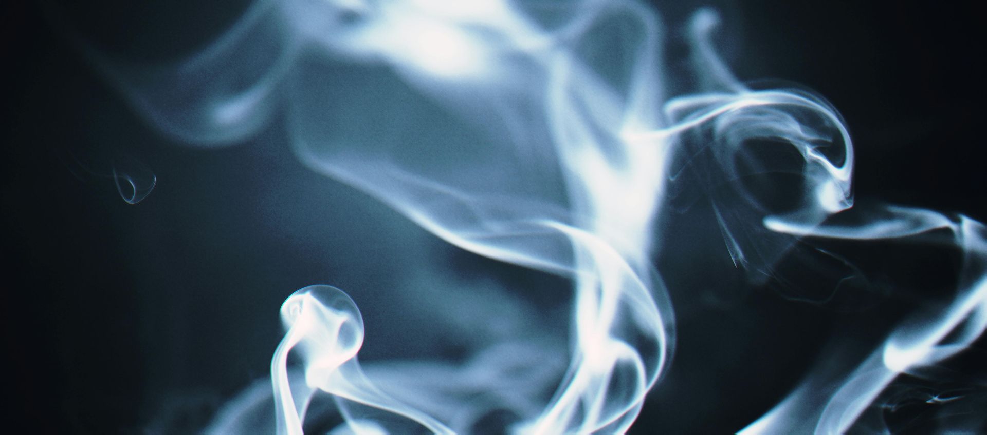 White smoke with black background