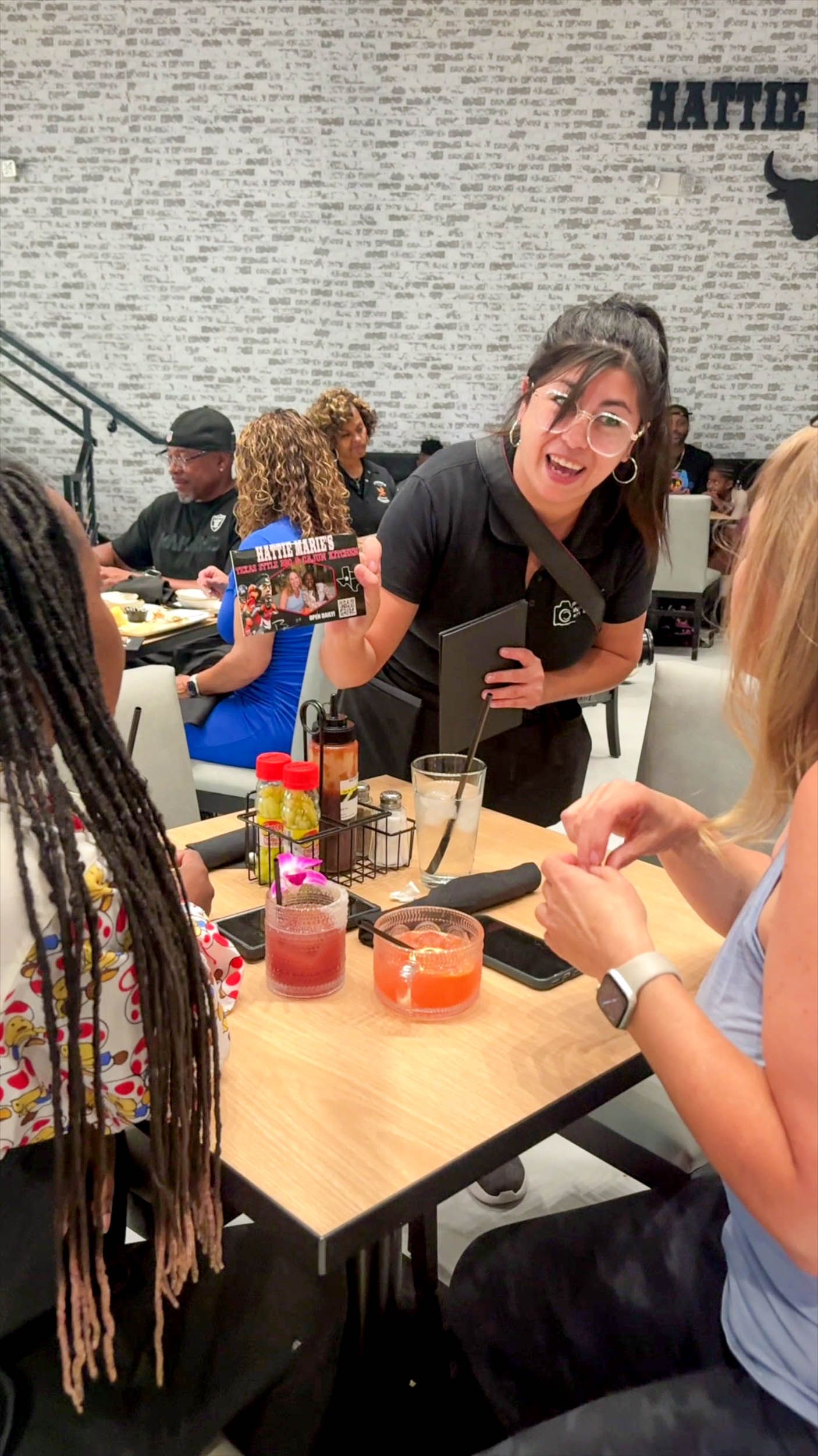 A Girl Serving Their Menu
