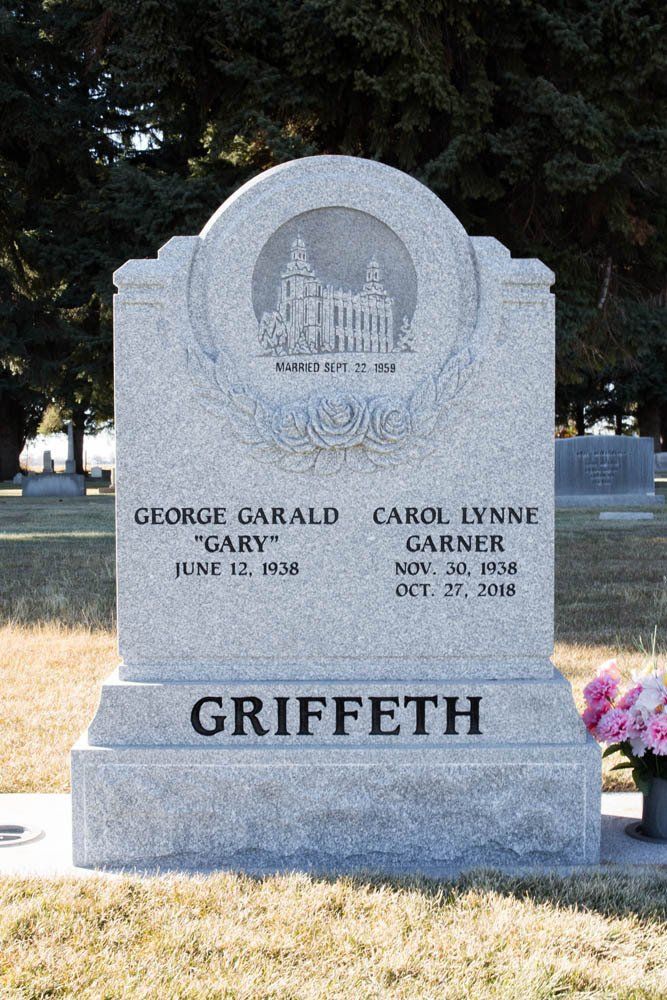 Traditional gray granite headstone for George and Carol Griffeth with LDS temple and rose etching