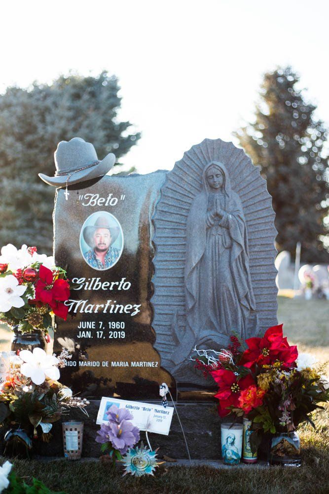 Engraved headstone for Gilberto “Beto” Martinez featuring image of Our Lady of Guadalupe and photo portrait
