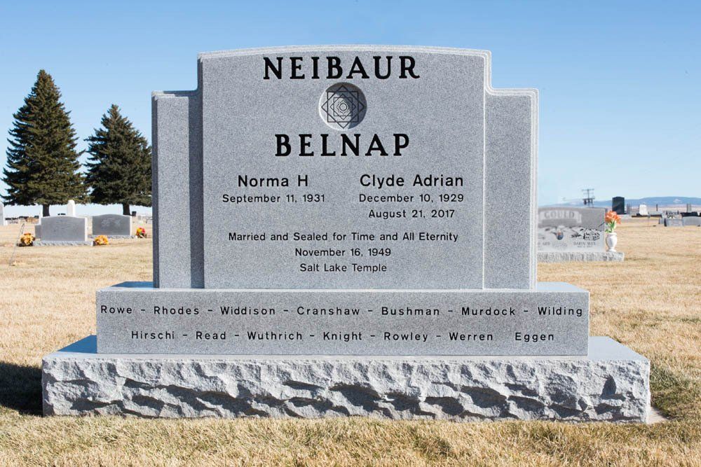 Frontal view of Neibaur Belnap family monument with LDS temple sealing reference and multiple surnames