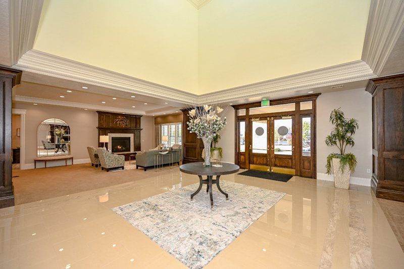 a different angle of the white pine funeral services funeral home building with the hearse out front