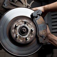 Shop — Repairing a Car's brake Pads in Fort Meyers, FL