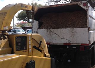 back of truck full of wood chippings