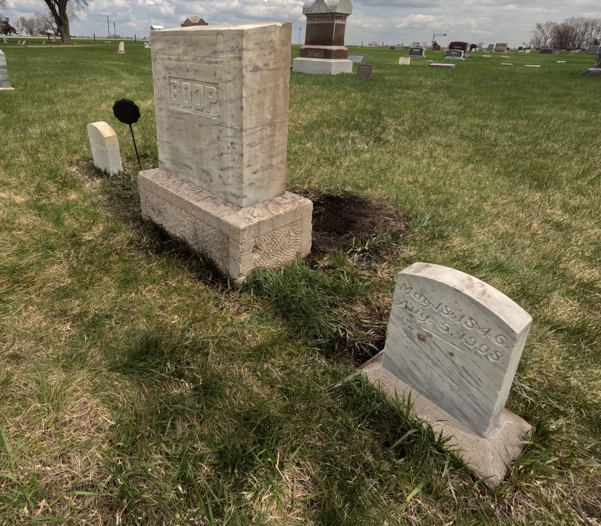 Three cleaned and repaired gravestones