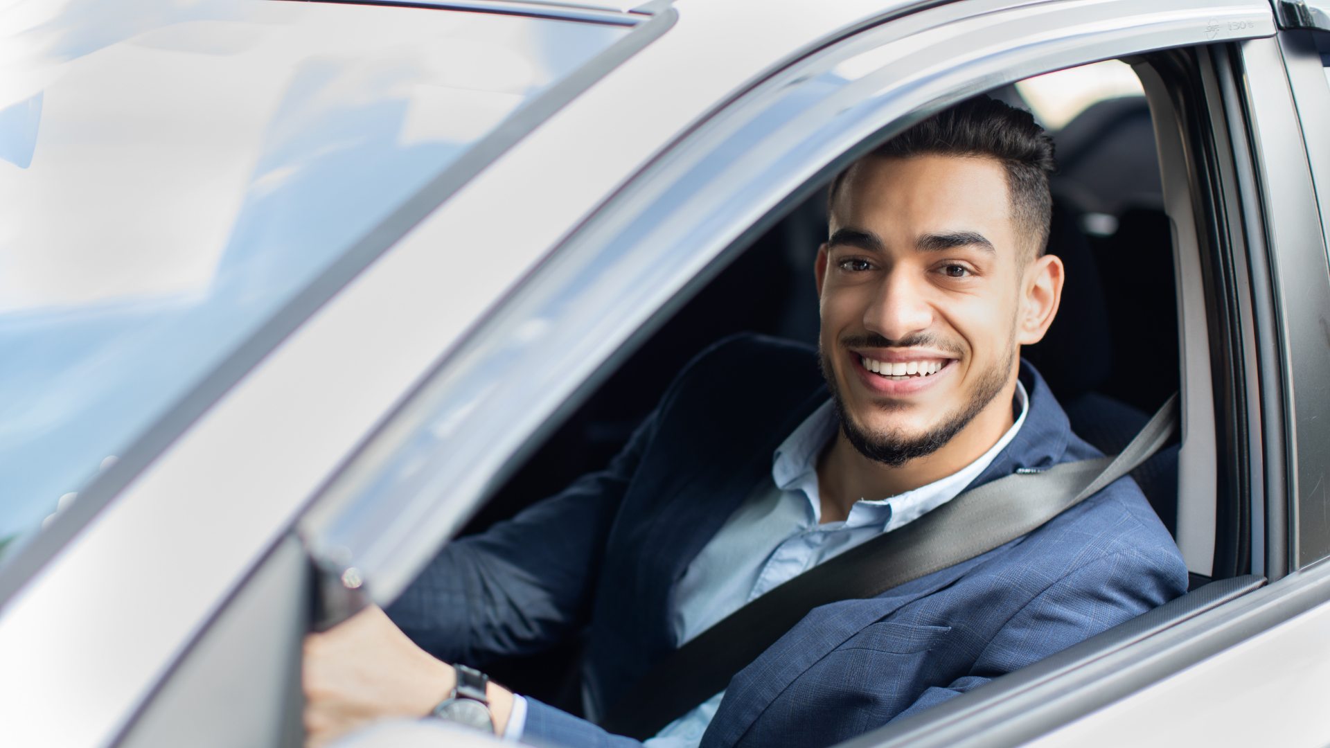 Three tennis balls are sitting on a tennis court