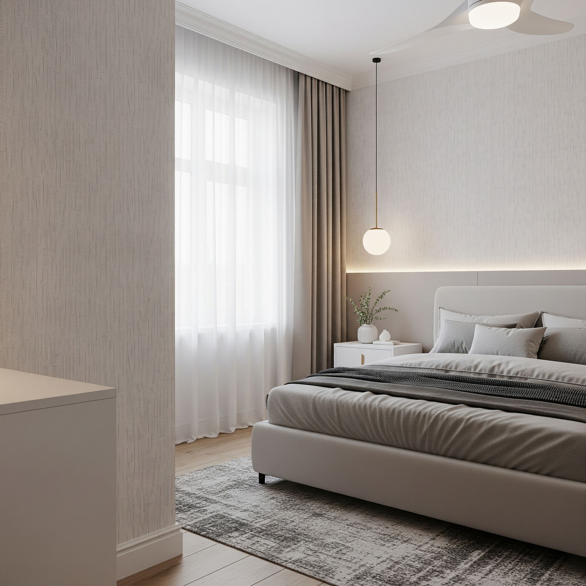 A bedroom with a large bed , a rug , a window and a ceiling fan.