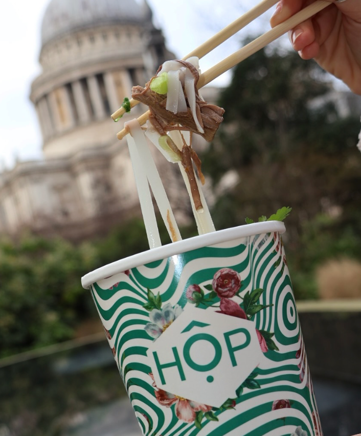 Beef pho noodles from HOP Vietnamese enjoyed outdoors near St Paul’s Cathedral in London