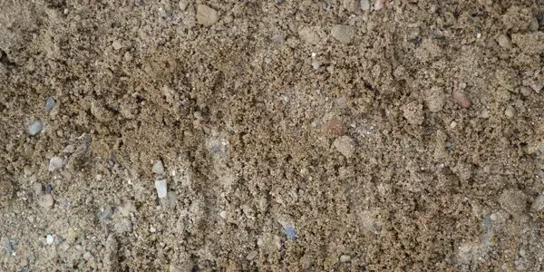 A close up of a pile of fill sand