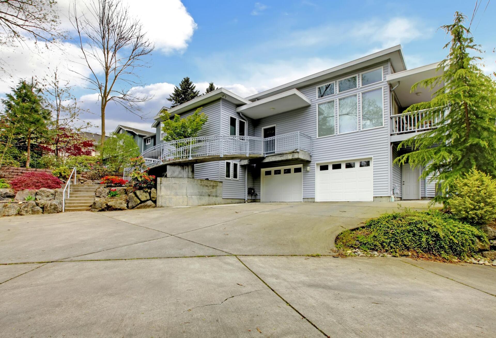 a house with concrete driveway
