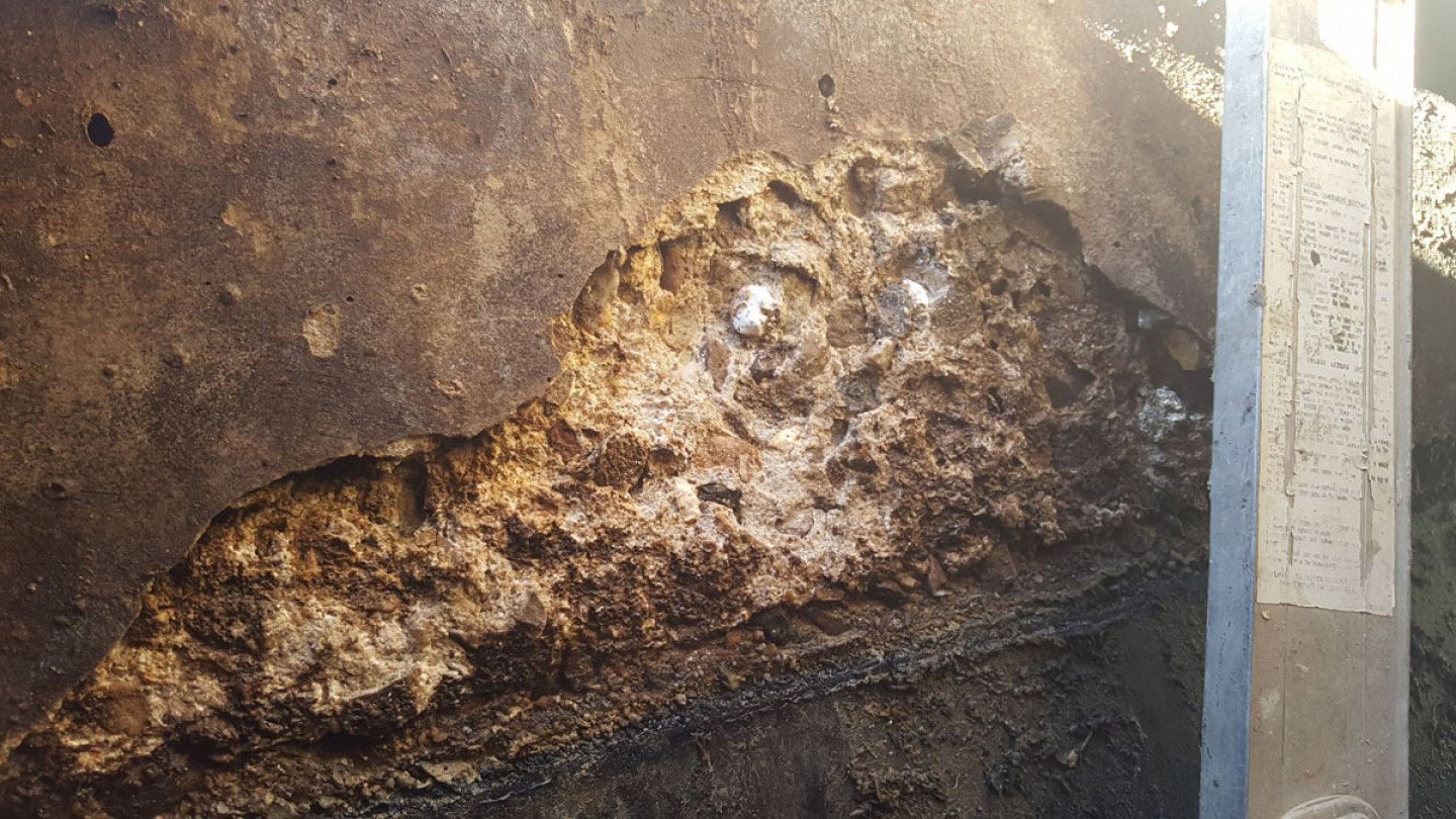 A close up of a piece of rock on the ground.