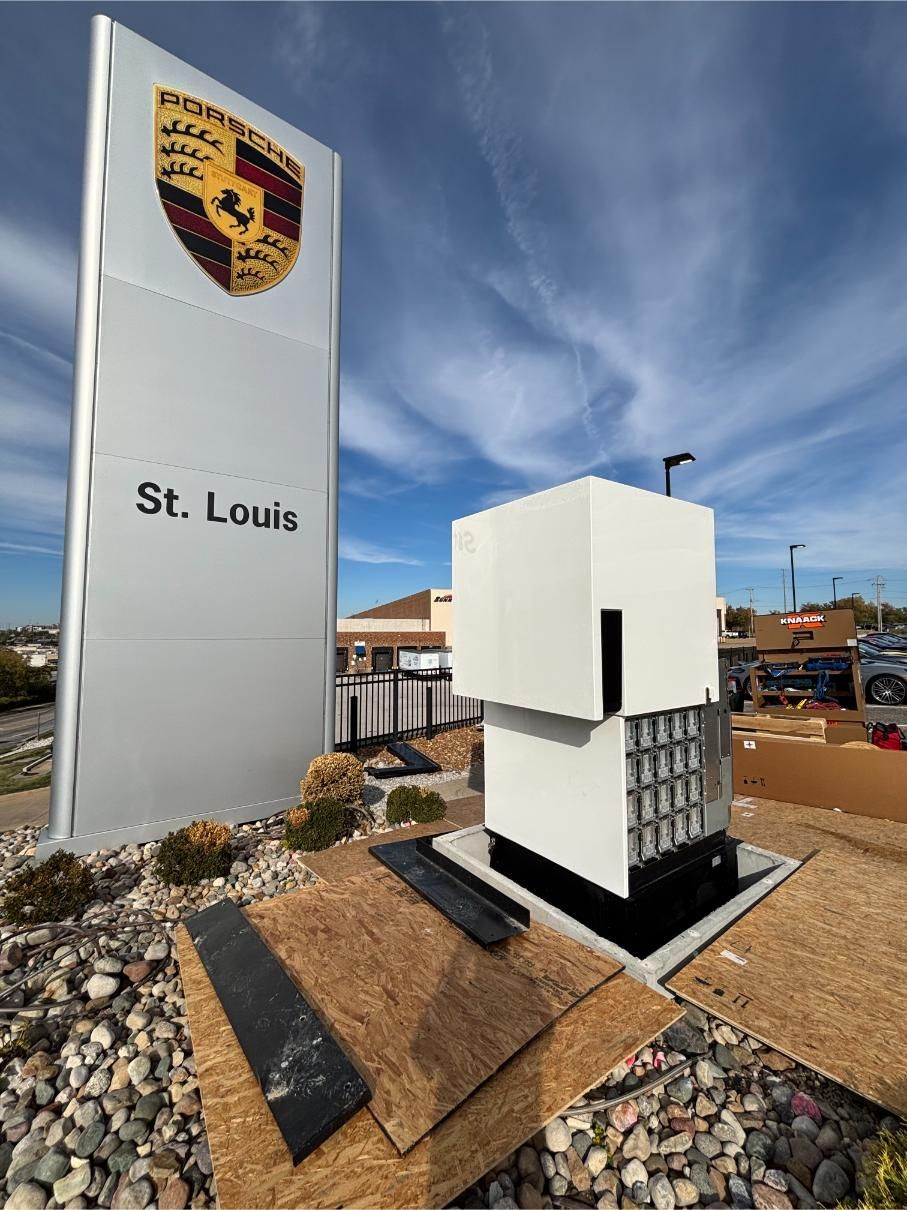 Group of construction workers in safety gear during a site safety briefing.