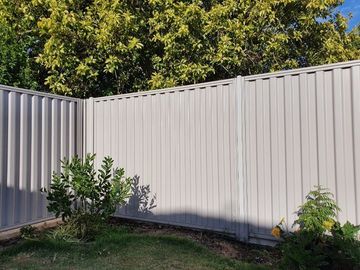 Newly installed colorbond fence for a residential backyard. Photo taken in  Wollongong NSW.