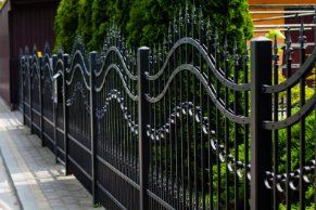 Newly installed metal fencing with sliding gates on a huge residential property in Wollongong NSW.