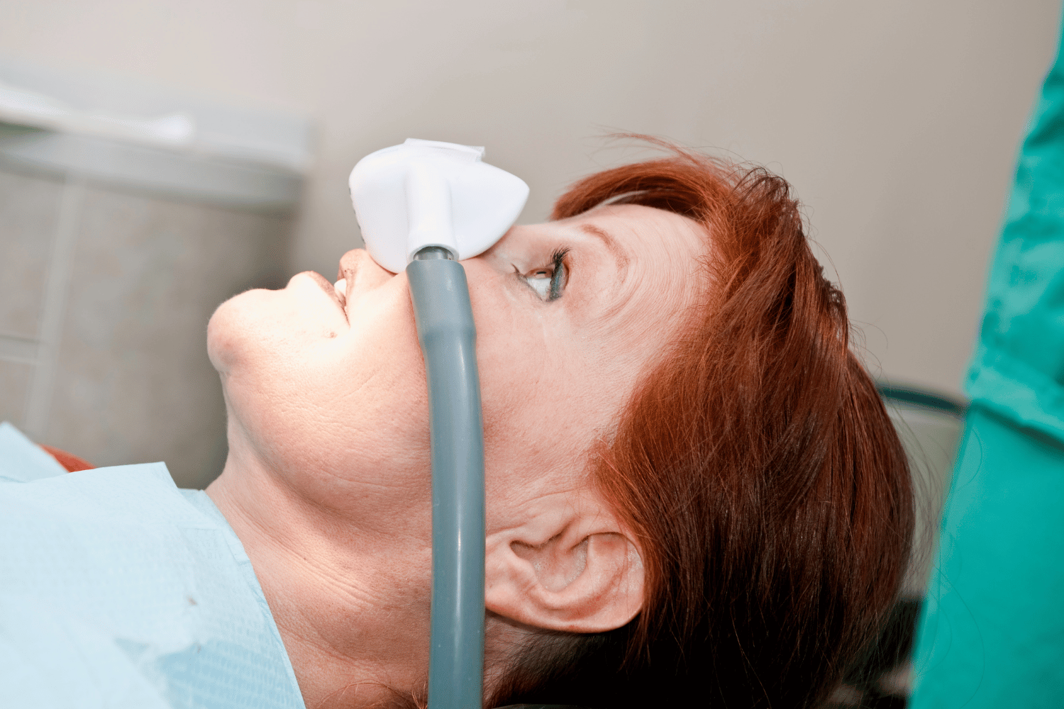 woman getting nitrous oxide in dental treatment room