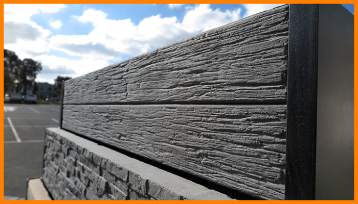 Charcoal concrete sleepers with timber-look texture in modern Canberra landscape