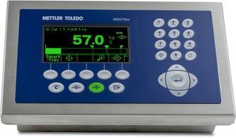 A digital scale with buttons and a screen that says 57.0