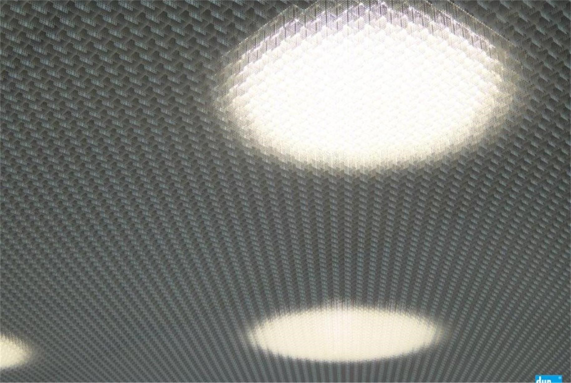 White ceiling with three bright, round lights. The ceiling has a textured pattern.