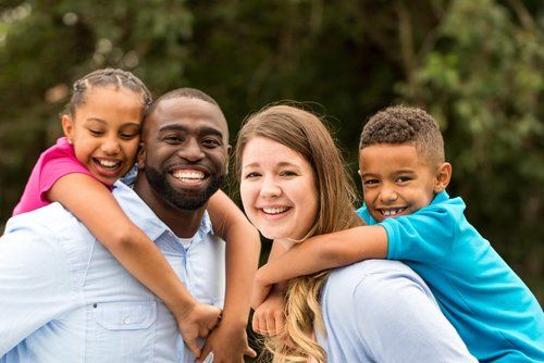 Happy couple with kids