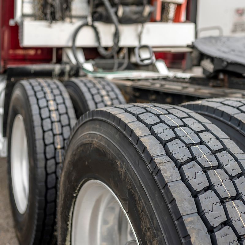 Close Up Photo Of Truck Wheels