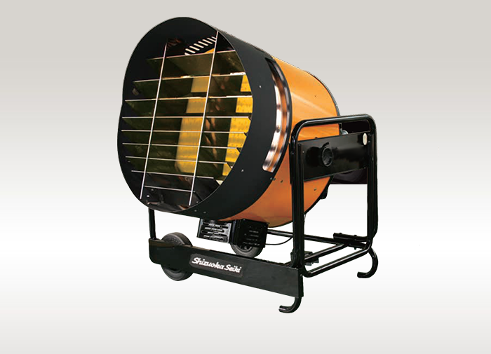 Orange and black industrial heater with a metal cage and wheels.