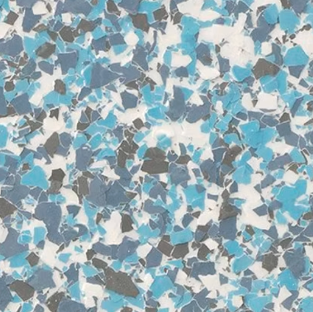 Blue, gray, and white speckled decorative epoxy flooring.