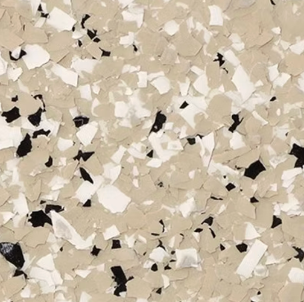 Tan, white, and black speckled epoxy floor coating.