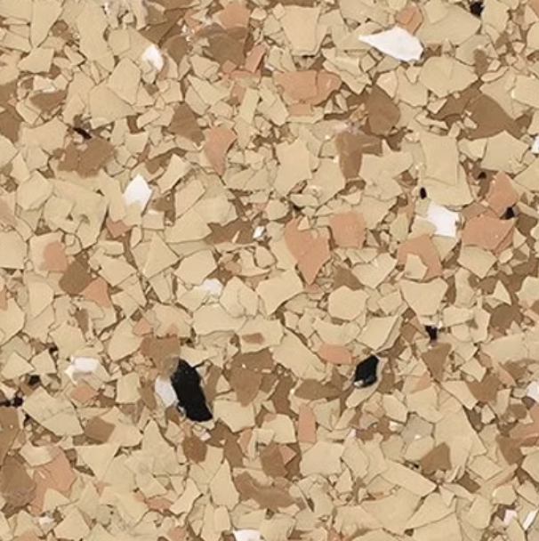 Tan, brown, and white decorative floor chips scattered across a surface.