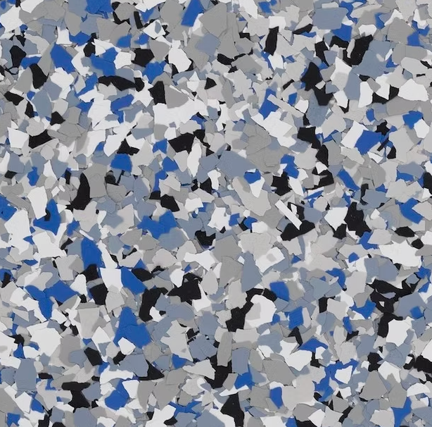Epoxy floor coating with blue, gray, white, and black chips.