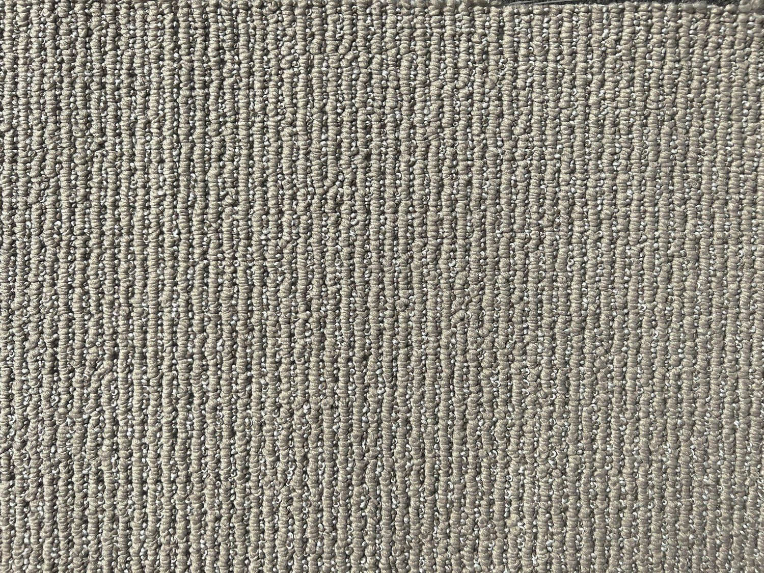 Las Vegas Event Flooring showing samples of Faux Sisal flooring in the smooth taupe color.