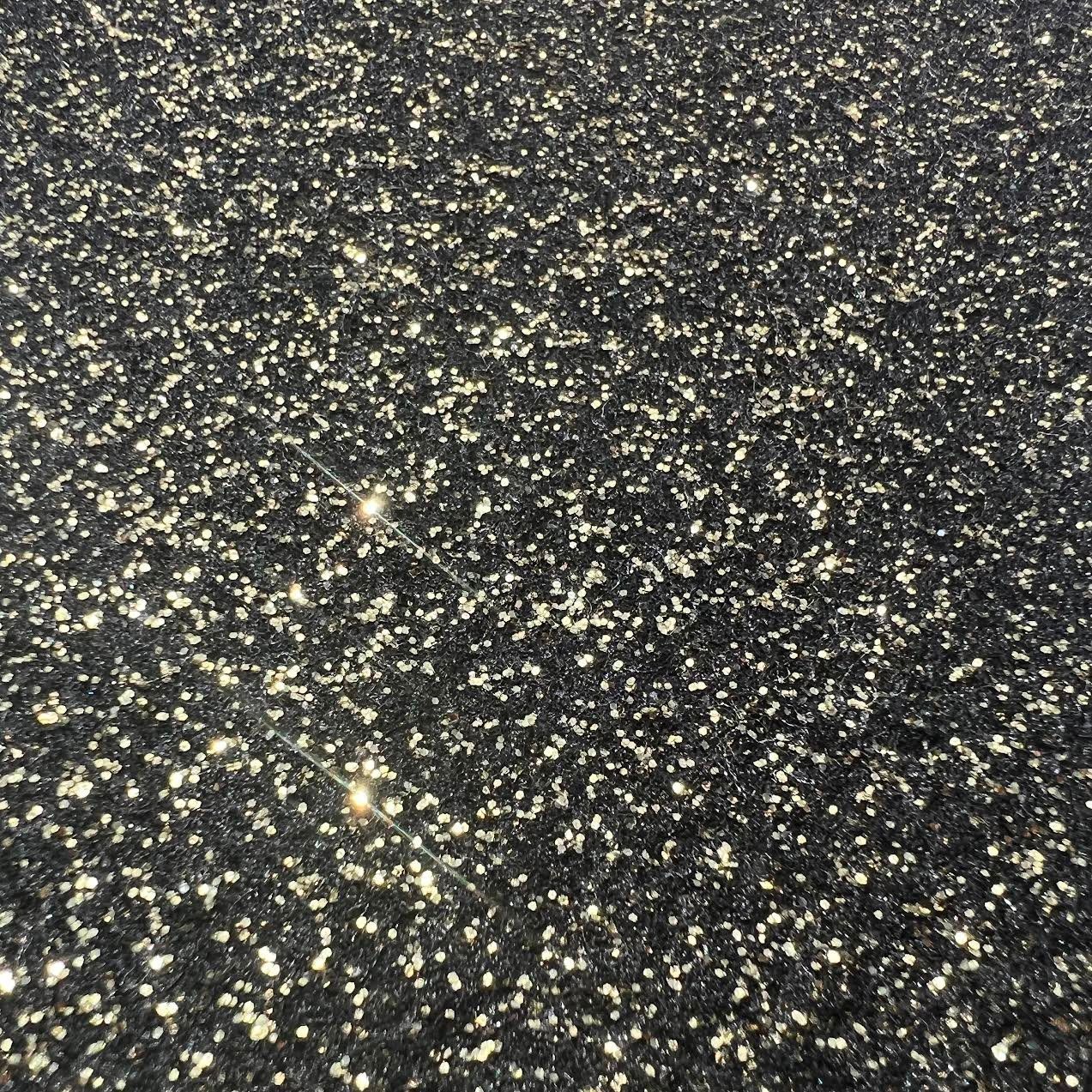 Las Vegas Event Flooring carpet samples showing the Glitter Magic Carpet model in the black/gold color.