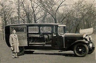 Sepia photo of hearse with funeral home owner approximate time frame 1800's