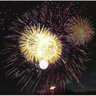 Melissa Pettersen Fireworks exploding in the night sky over  Butte, MT