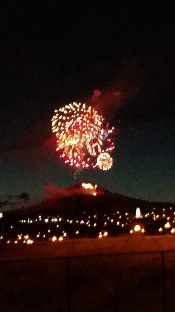 Tayler Wellenstein Fireworks exploding in the night sky over  Butte, MT