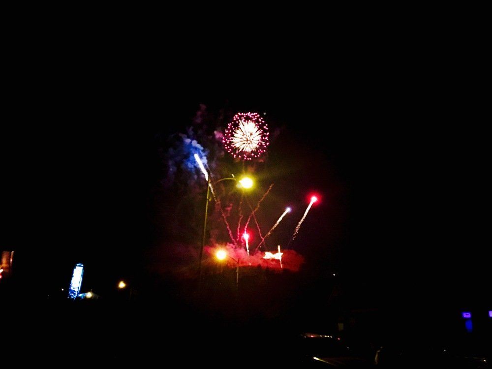 J. Peck Fireworks exploding in the night sky over  Butte, MT
