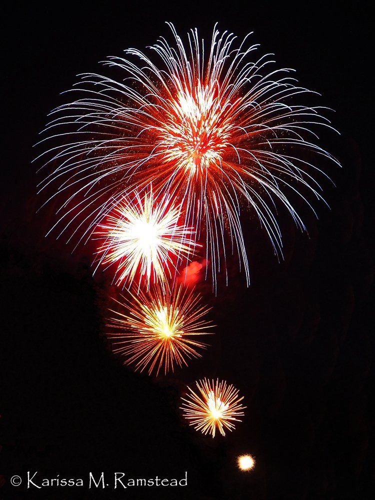 Karissa Ramstead Fireworks exploding in the night sky over  Butte, MT