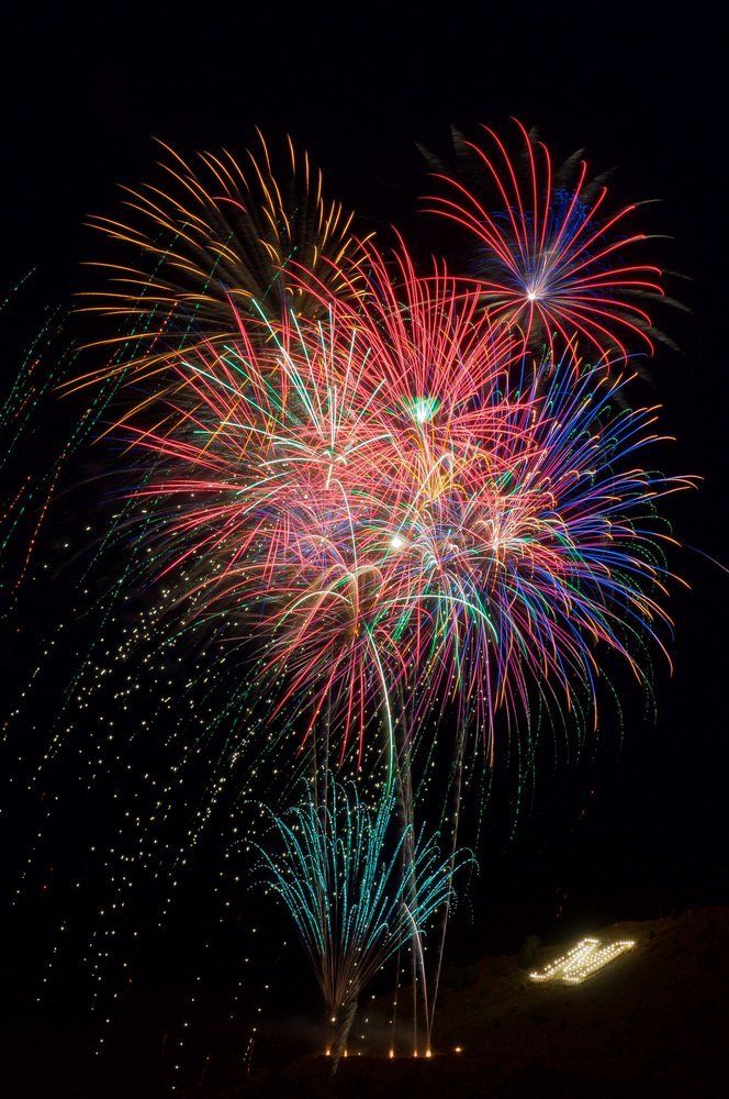 Kelsey Gauthier Fireworks exploding in the night sky over  Butte, MT