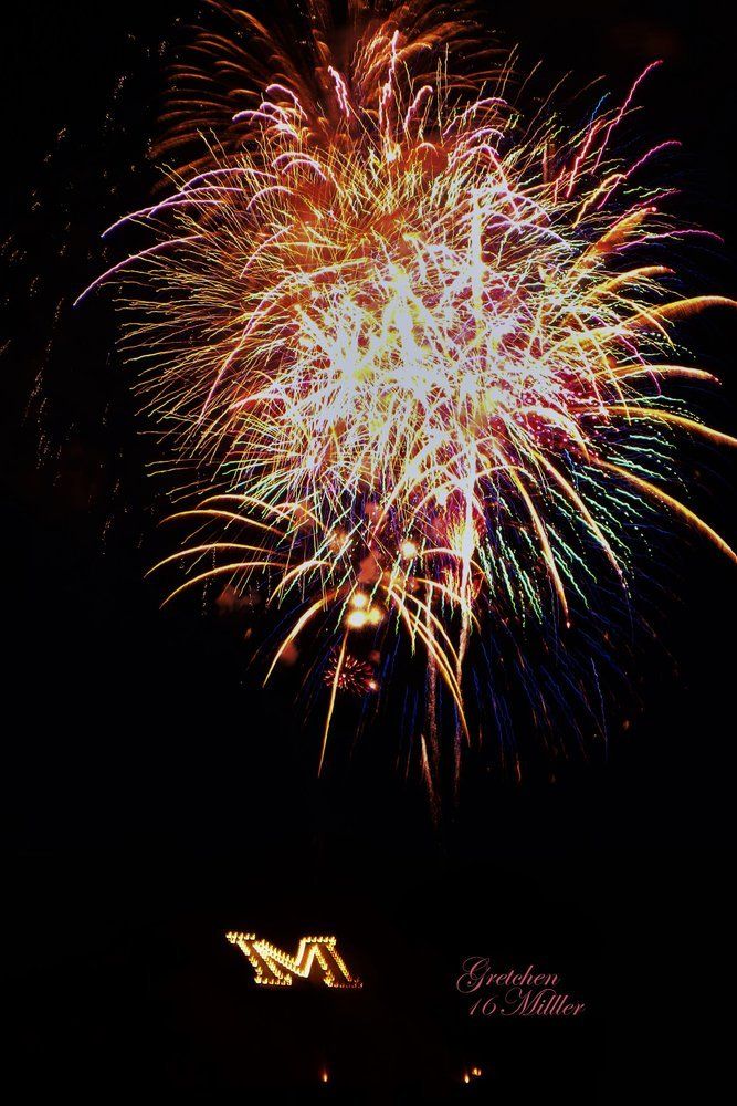 Gretchen Miller Fireworks exploding in the night sky over  Butte, MT