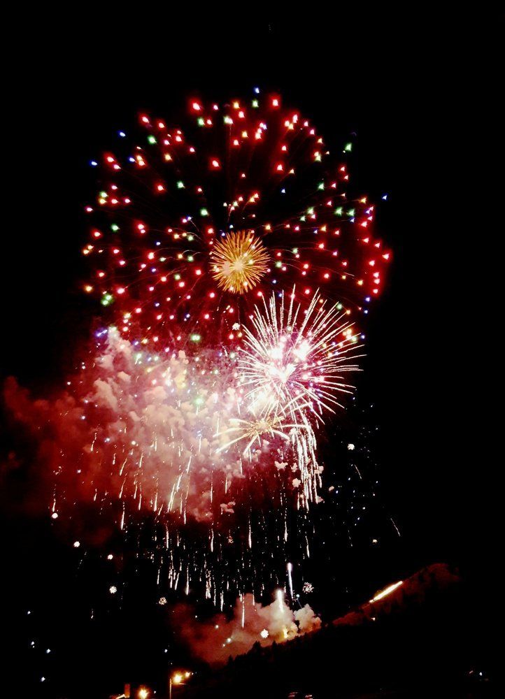 Kayla Lutey Fireworks exploding in the night sky over  Butte, MT