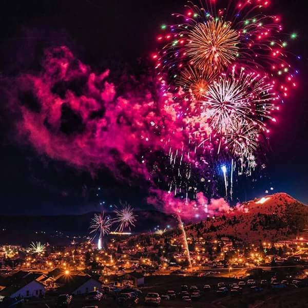 Hazer Live Fireworks exploding in the night sky over  Butte, MT