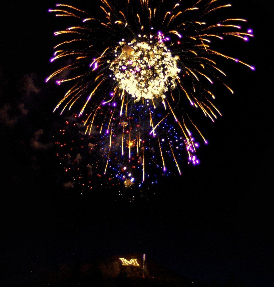 Kevin Mellott Fireworks exploding in the night sky over  Butte, MT