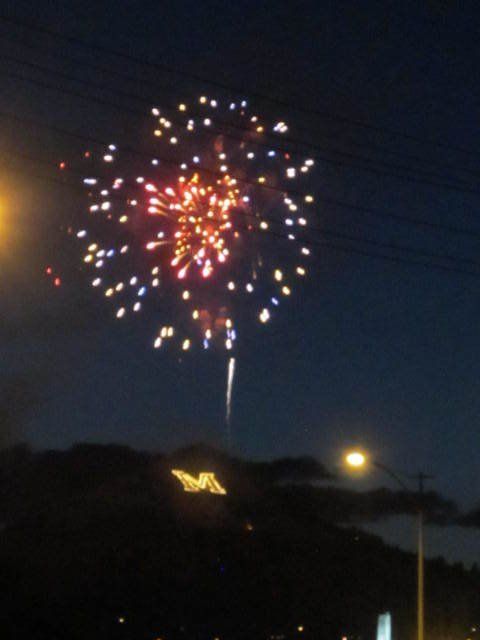 Rhett Bayliff Fireworks exploding in the night sky over  Butte, MT
