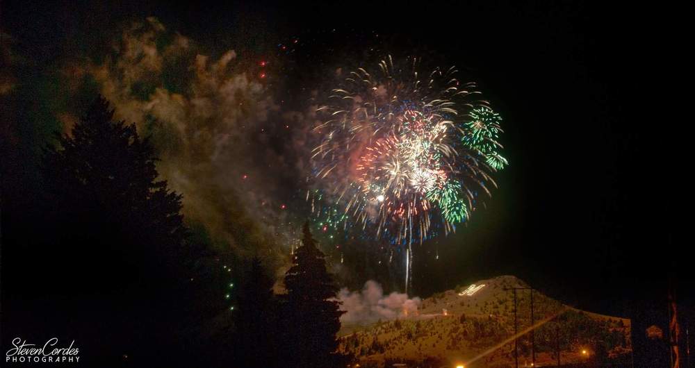 Steven Cordes Fireworks exploding in the night sky over  Butte, MT