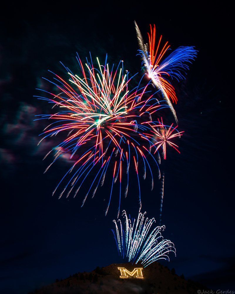 Jack Gerdes Fireworks exploding in the night sky over  Butte, MT