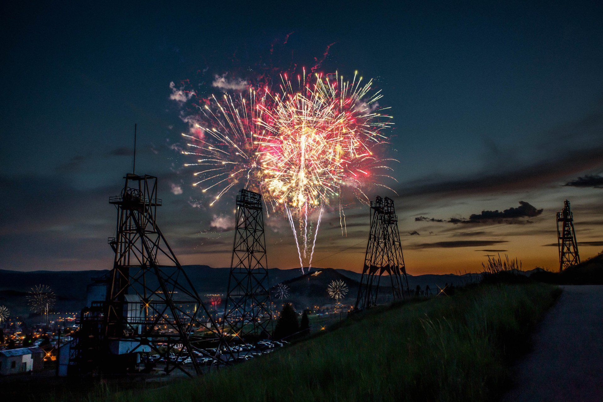 Angela Haaland Fireworks exploding in the night sky over  Butte, MT