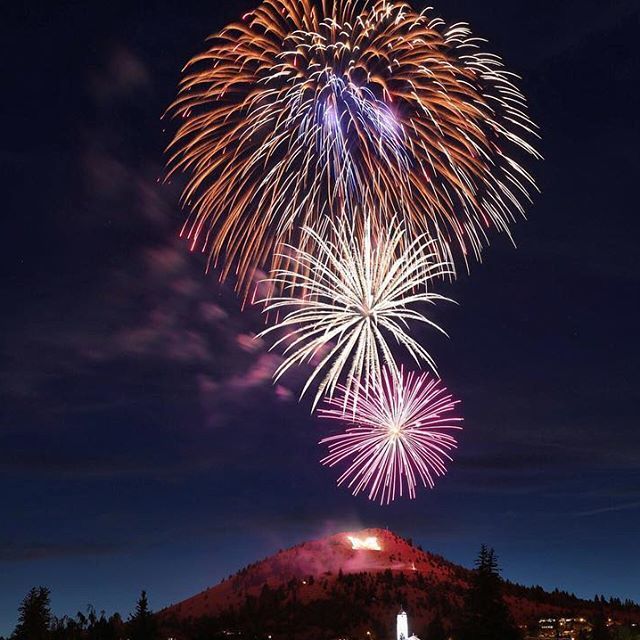 Keaton Foley Fireworks exploding in the night sky over  Butte, MT