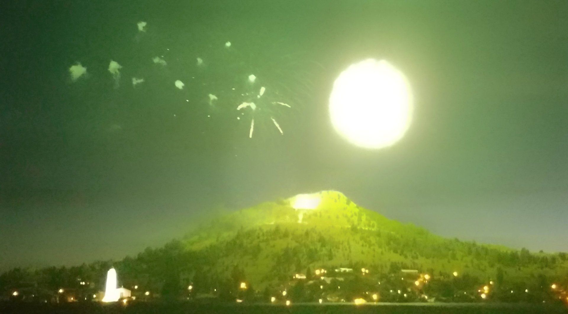 Tanner Wiley Fireworks exploding in the night sky over  Butte, MT